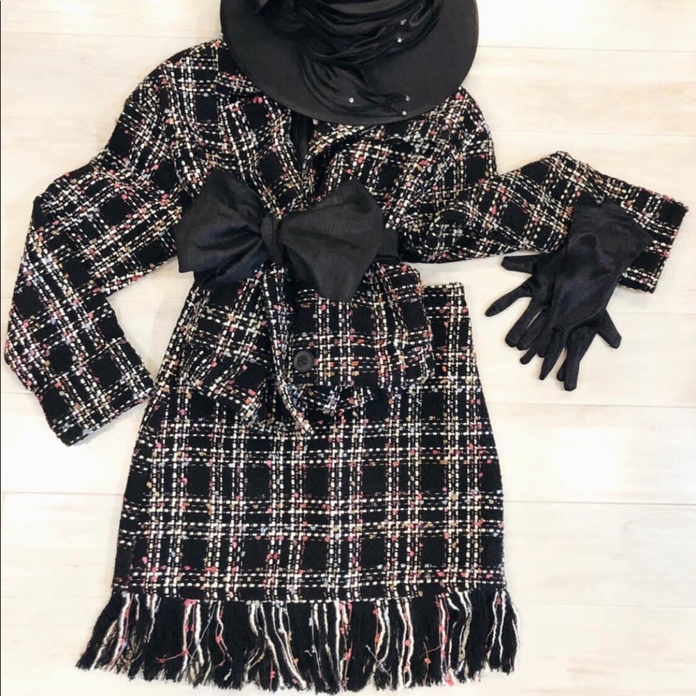 Herringstone black tweed with pinks and white suit.